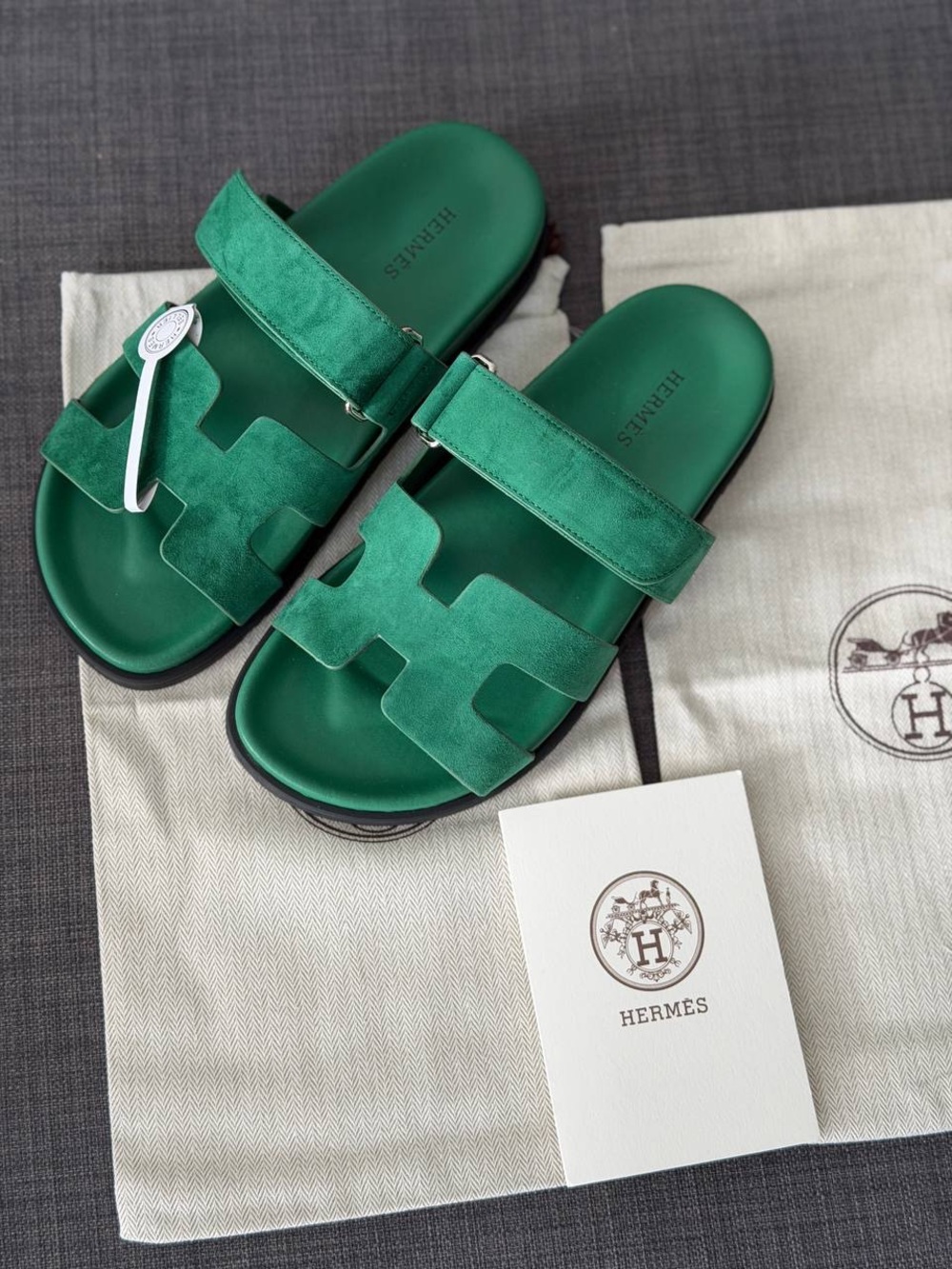 Woman green slides in hermes style